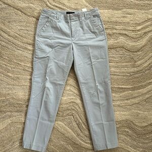 Banana Republic khaki pants. I am 5’4” and they hit at the ankle. Worn twice.